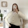 Pull gilet boutonné blanc cassé en maille